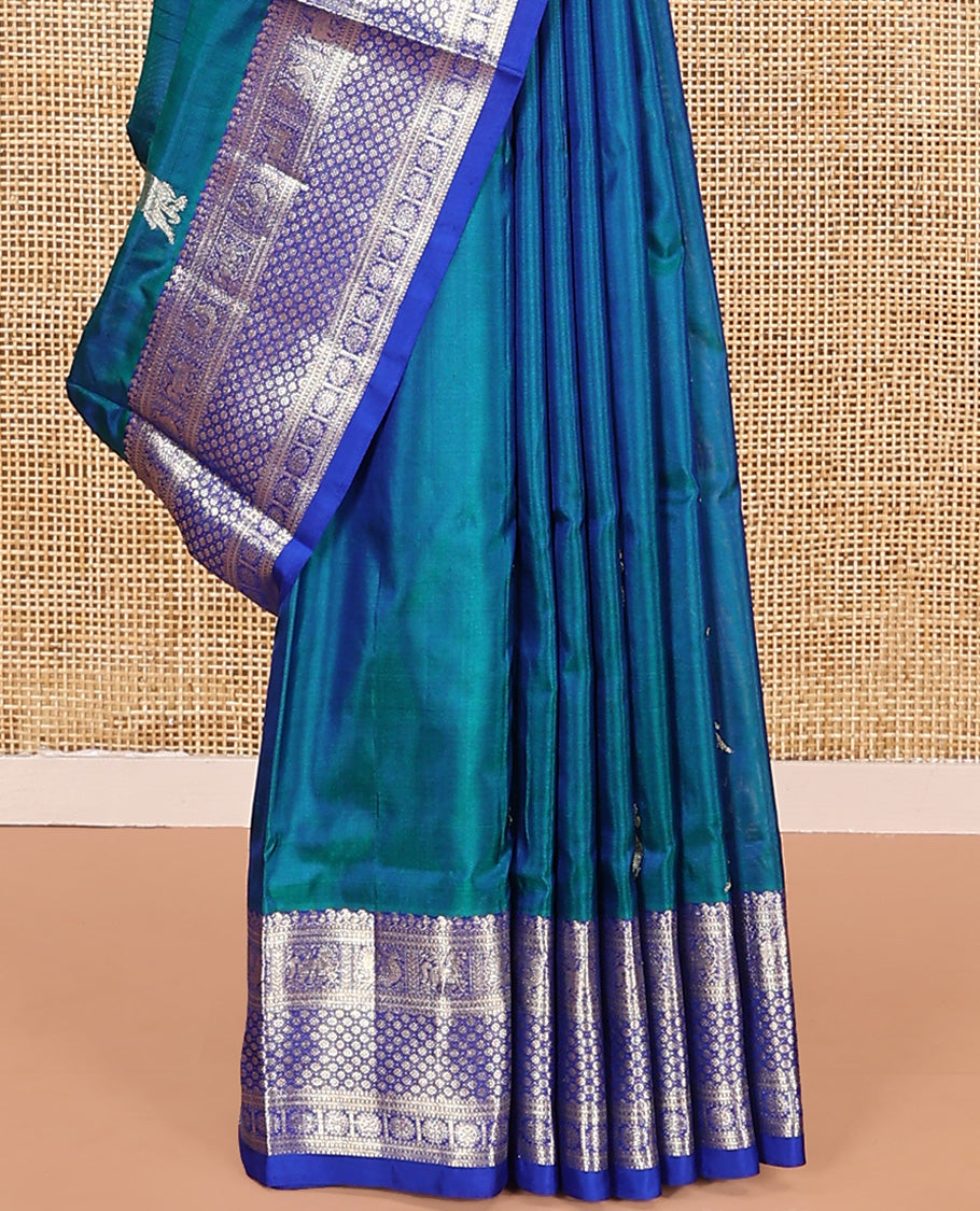 Blue peacock buttas Venkatagiri silk saree, contrast traditional zari design border, and zari-rich jaal pallu