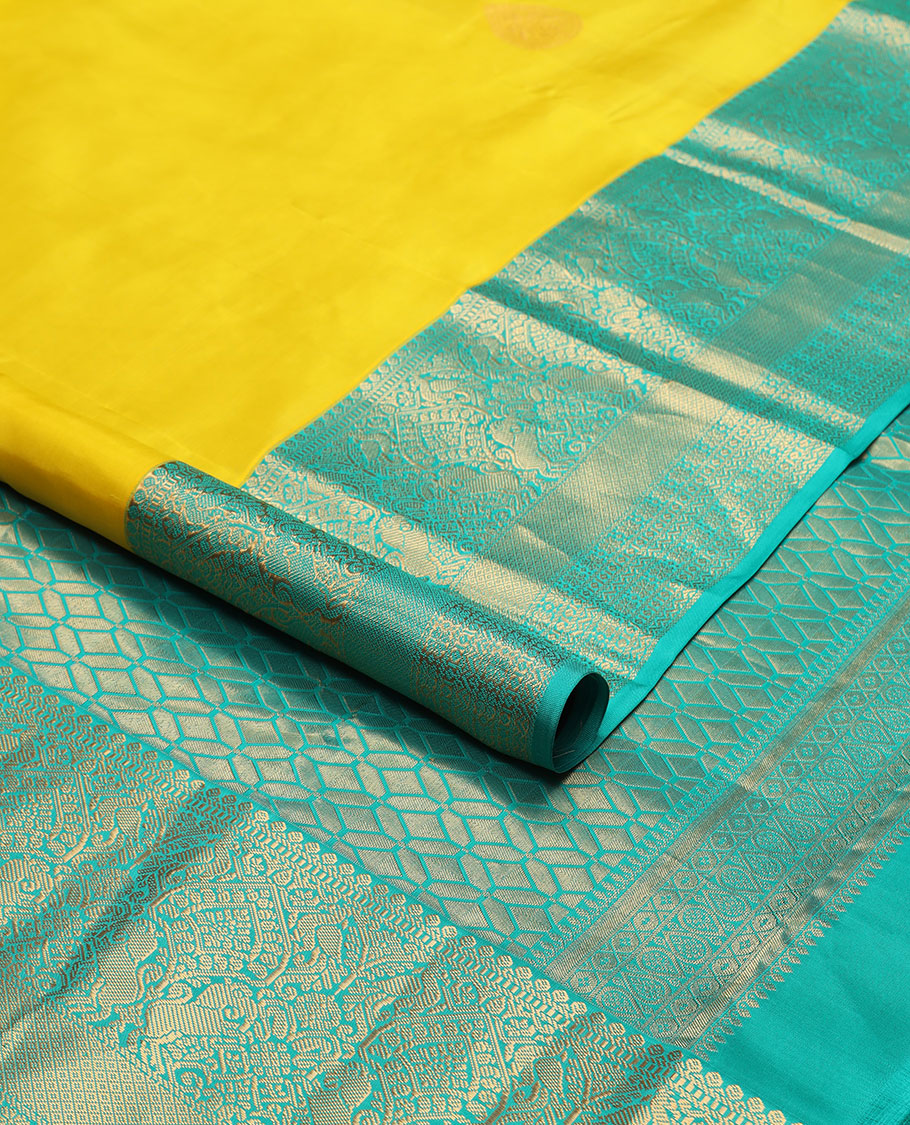 Yellow buttas silk saree with contrast zari design border & floral jaal design pallu
