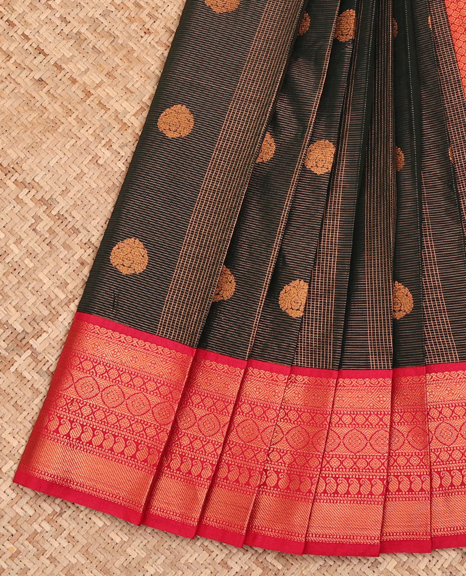Black Budget Silk Saree, Spotlighted with Zari Stripes and Zari Buttas All Over Its Body, Complemented by a Contrast Traditional Zari Border, Grand Jaal Pallu, and Paired with a Contrast Blouse
