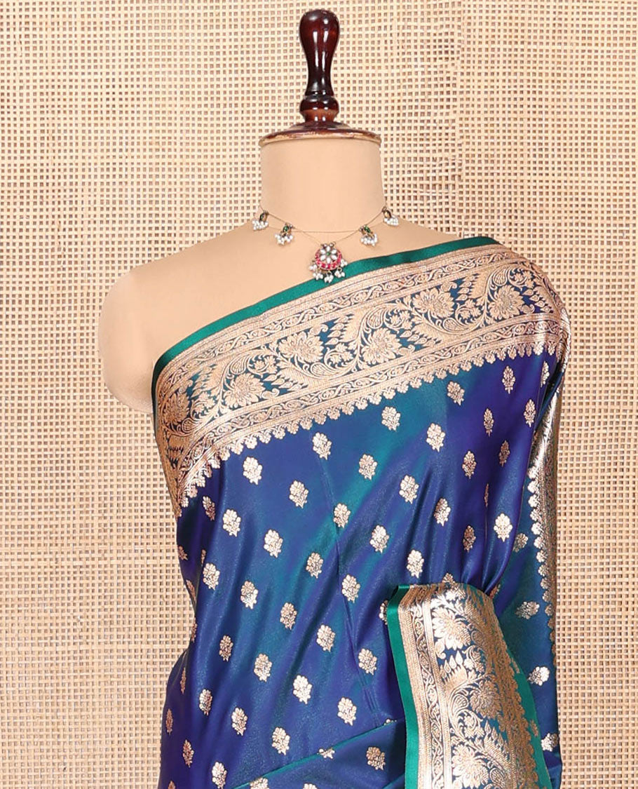 Blue Banarasi Nylon Saree, Majestically Detailed with Zari Buttas, Highlighted by a Floral Creeper Zari Border, Intricate Pallu, and a Matching Blouse