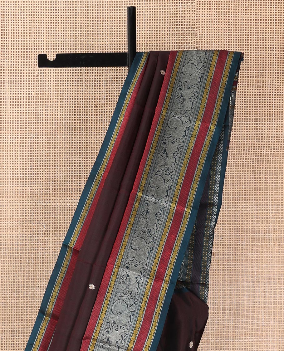 Brown mayil chakram thread buttas Kanchipuram silk saree, contrast border of thilakam mokku, mayil, yaali, and rudraksham, and pallu of big Nava Nari Kunjara motif