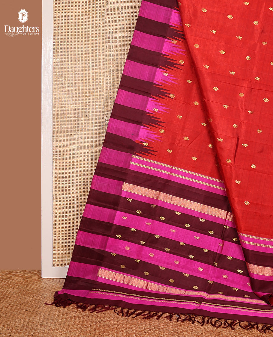 Red zari buttas Kanchipuram silk saree, contrast thazampoo rekku dual colored border of floral buttas, and zari woven pallu