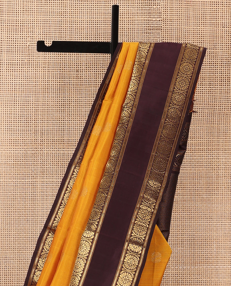 Mustard striped with chakram motifs Kanchipuram silk saree, contrast rettai pettu zari border of kathir, and poo chakram designs