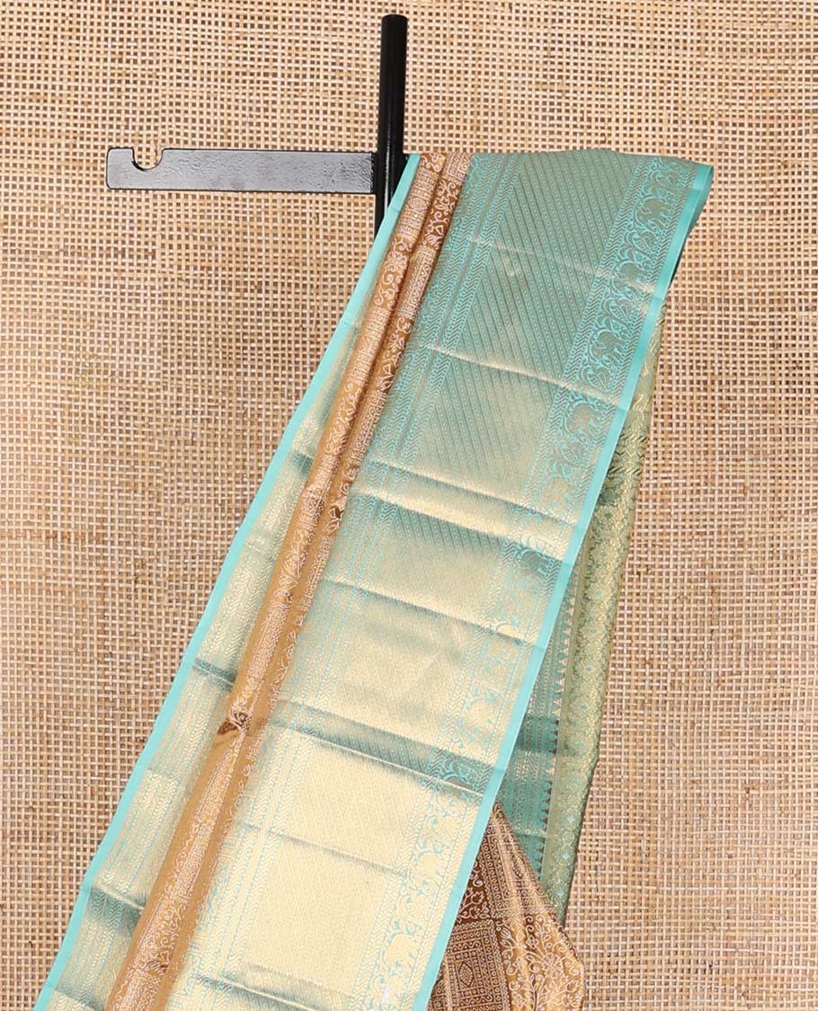 Brown floral design kancheepuram silk saree with contrast border of thilakam mokku, muthu, banaras, mayil, yanaai design & zari design pallu