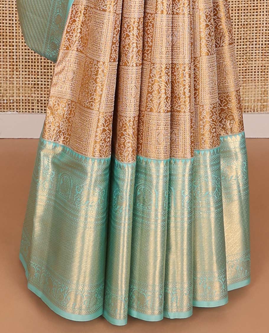 Brown floral design kancheepuram silk saree with contrast border of thilakam mokku, muthu, banaras, mayil, yanaai design & zari design pallu