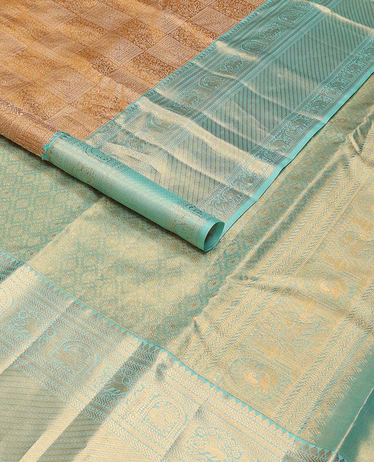 Brown floral design kancheepuram silk saree with contrast border of thilakam mokku, muthu, banaras, mayil, yanaai design & zari design pallu