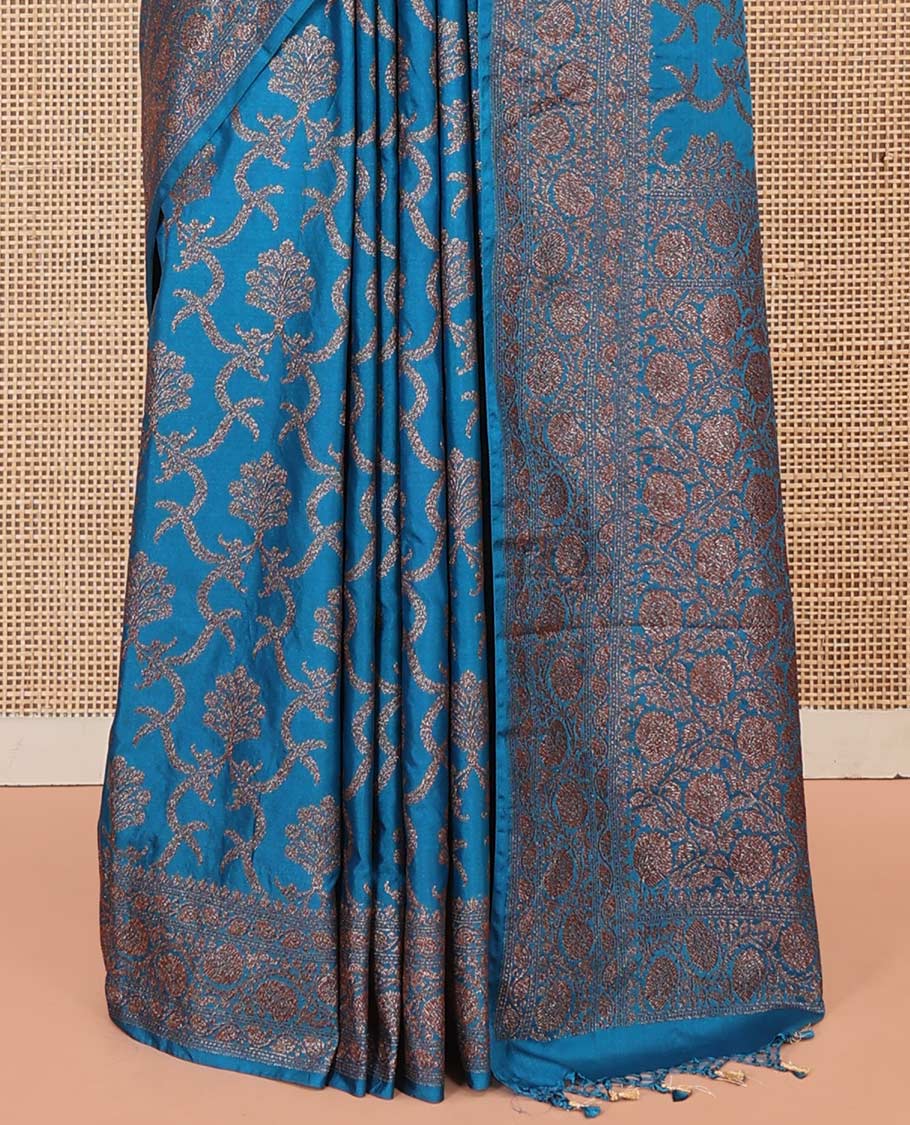 Blue Mushru Silk Saree, Mesmerized with Floral Jacquard Design on Its Body, Sparsely Sparkled Zari Border, Zari-Rich Pallu of Floral Jaal Designs, and Paired with a Matching Blouse