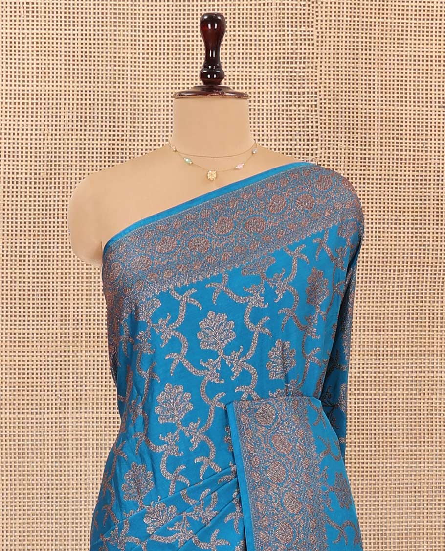 Blue Mushru Silk Saree, Mesmerized with Floral Jacquard Design on Its Body, Sparsely Sparkled Zari Border, Zari-Rich Pallu of Floral Jaal Designs, and Paired with a Matching Blouse