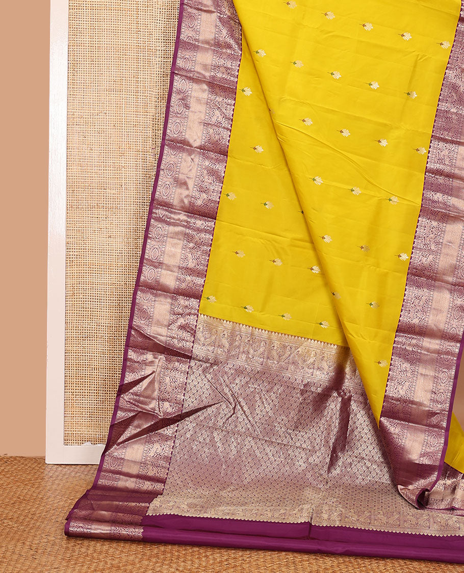 Yellow meena buttas silk saree, contrast border of thilakam,muthu,kuthirai, chakram & mayil kann & pallu of leaf designs