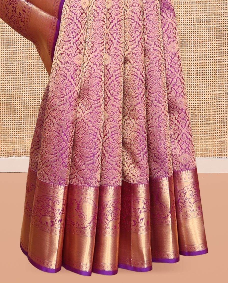 Pink Kanchipuram Wedding Silk Saree, Graced with Jacquard Design, a Zari Border of Thilakam Mokku, Muthu, Rudraksham, Yaanai and Mayil, Grand Pallu, and a Matching Blouse