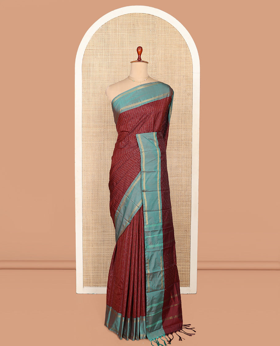 Maroon Aarani Silk Saree, Enriched with Butta Enclosed Checked Design on Its Body, Complemented by a Contrast Zari Striped Border, Pallu of Butta Enclosed Checks, and Paired with a Matching Blouse