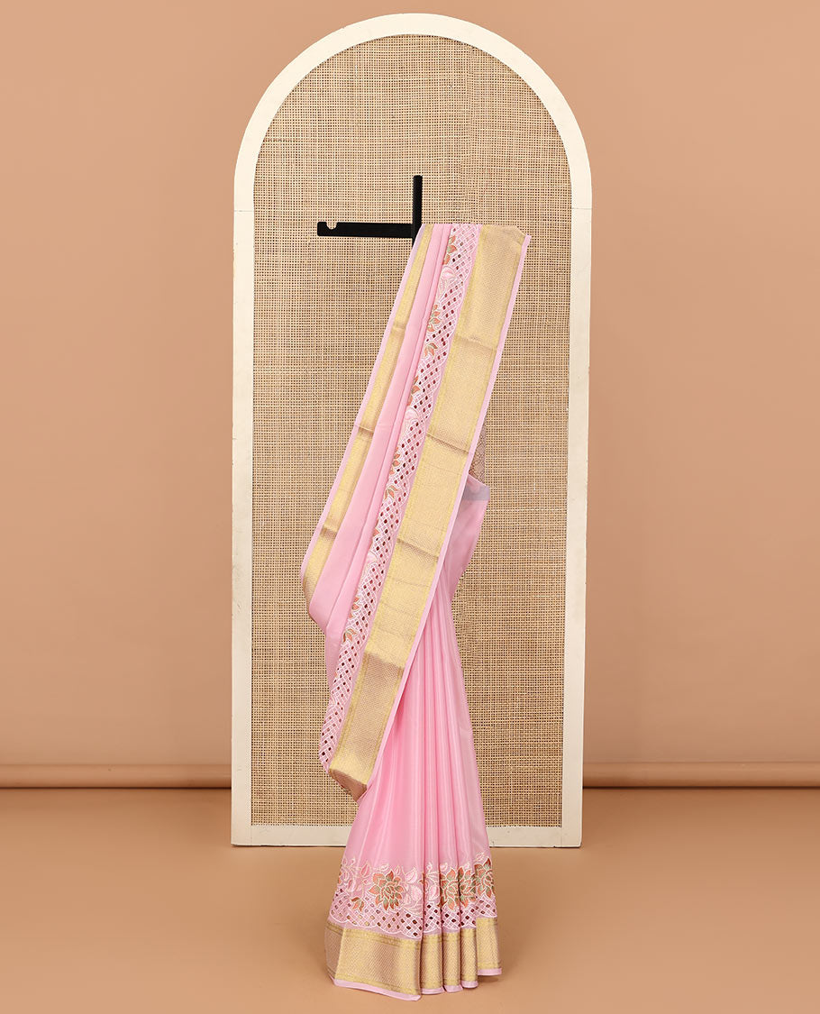 Pink plain satin silk saree, zari border of floral creeper design, and zari rich jaal pattern