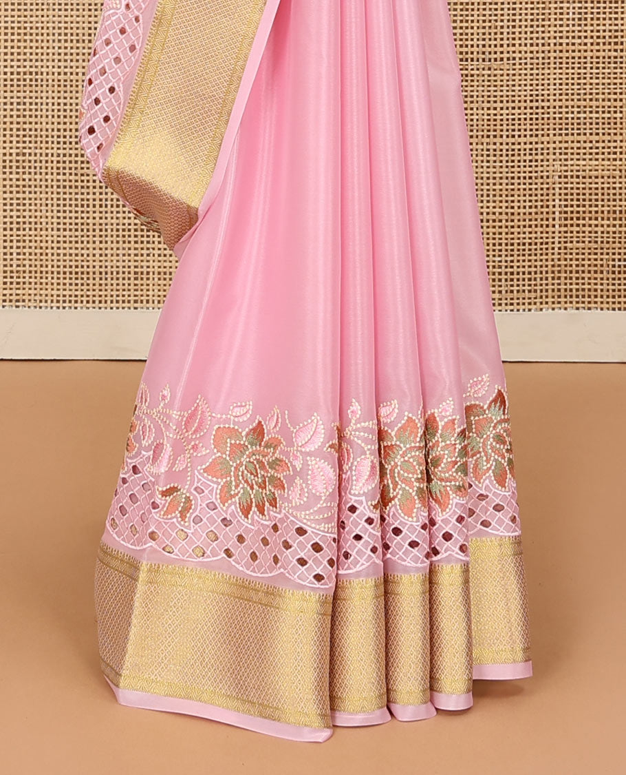 Pink plain satin silk saree, zari border of floral creeper design, and zari rich jaal pattern
