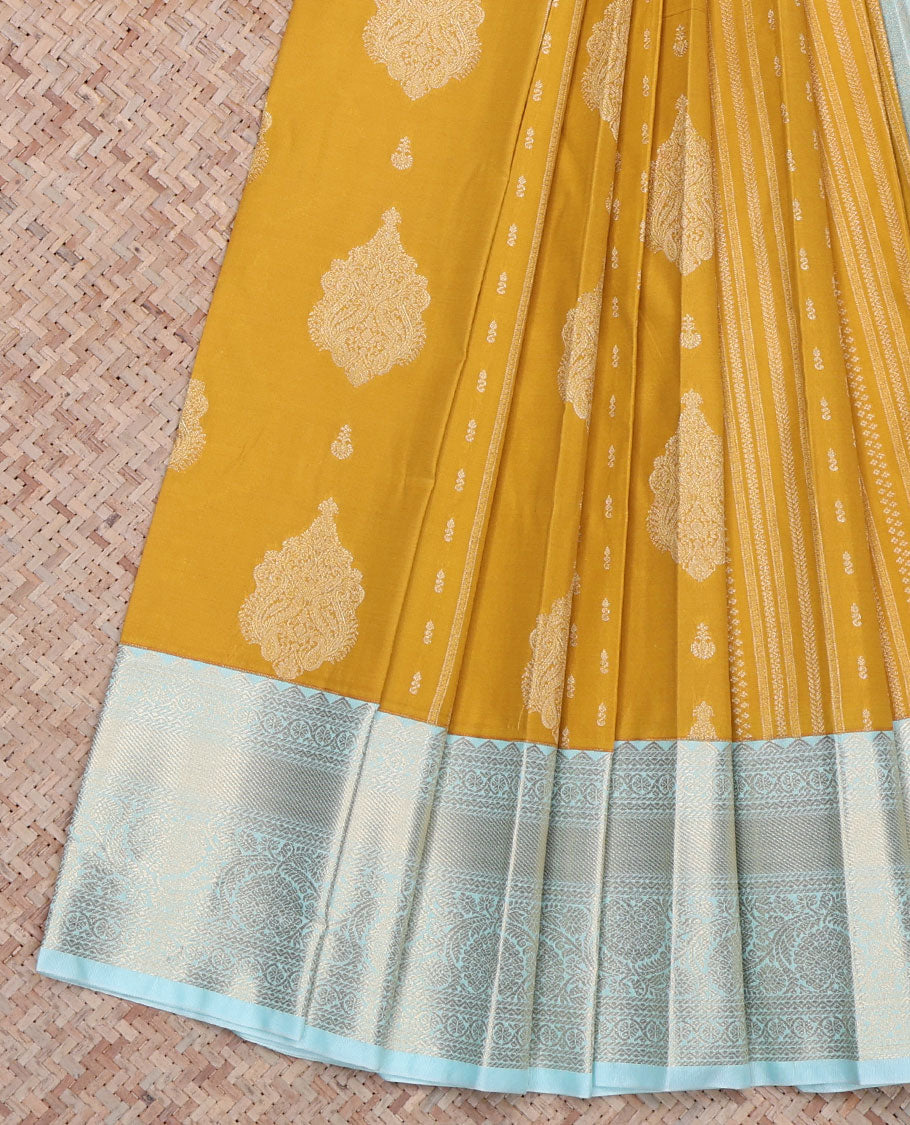 Yellow Budget Silk Saree, Decorated with Zari Buttas All Over Its Body, Complemented by a Contrast Traditional Zari Design Border of Floral Creeper Designs, Pallu Features Diagonal Designs, and Paired with a Contrast Blouse