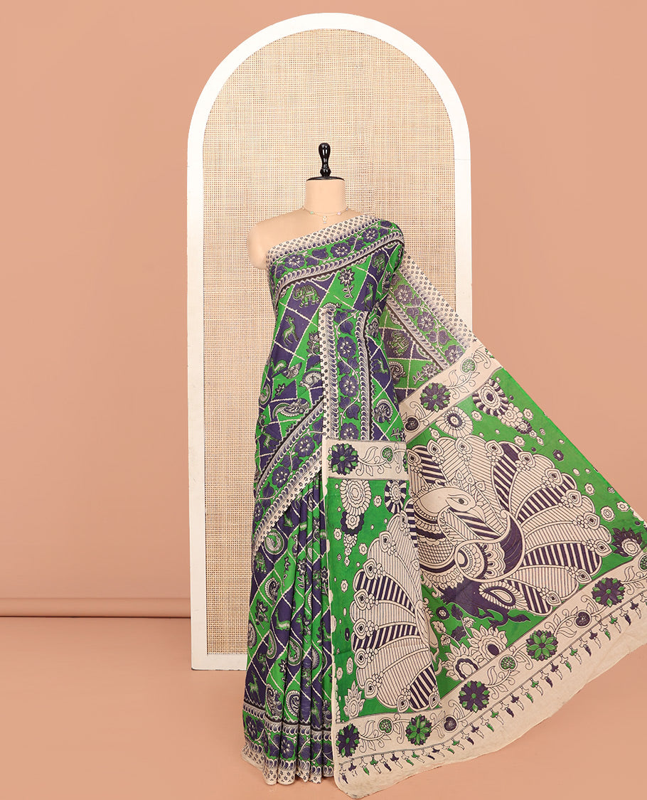 Blue-Green Machine-Printed Kalamkari Cotton Saree Features Butta Enclosed Jaal, Floral Printed Border, Pallu of Peacocks, and a Contrast Blouse