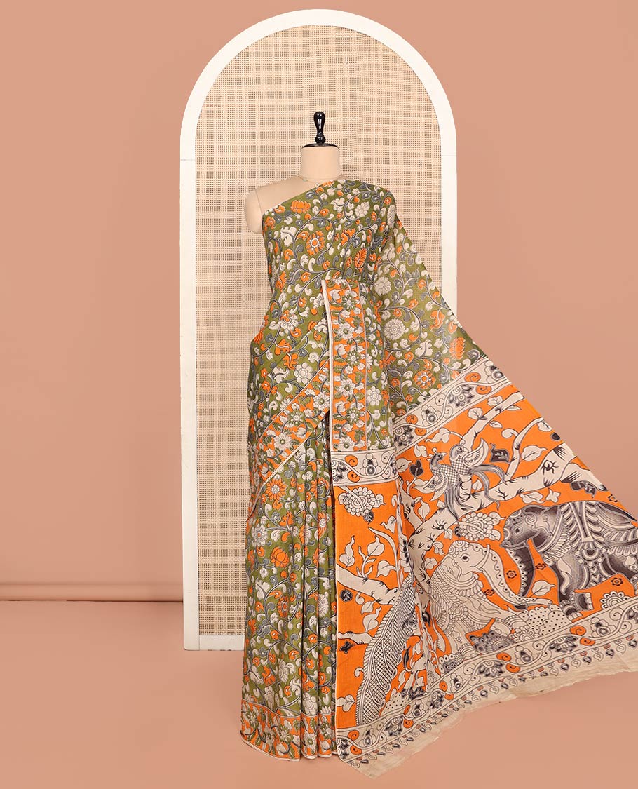 Green Machine-Printed Kalamkari Cotton Saree Features Floral Vine Design, a Floral Printed Border, Pallu of Fauna Motifs, and a Contrast Blouse