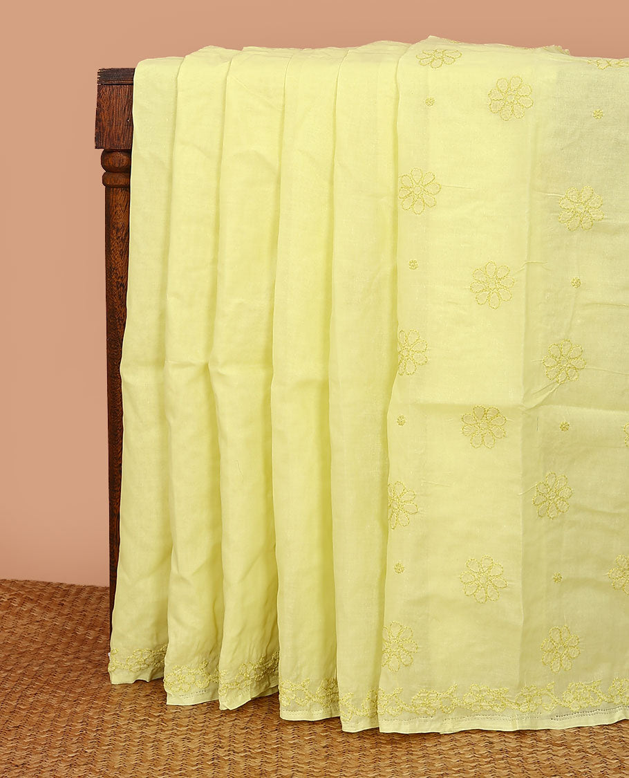 Yellow flowers thread embroidered Lucknowi chikankari saree, floral design border, and flora-paisley embroidered pallu