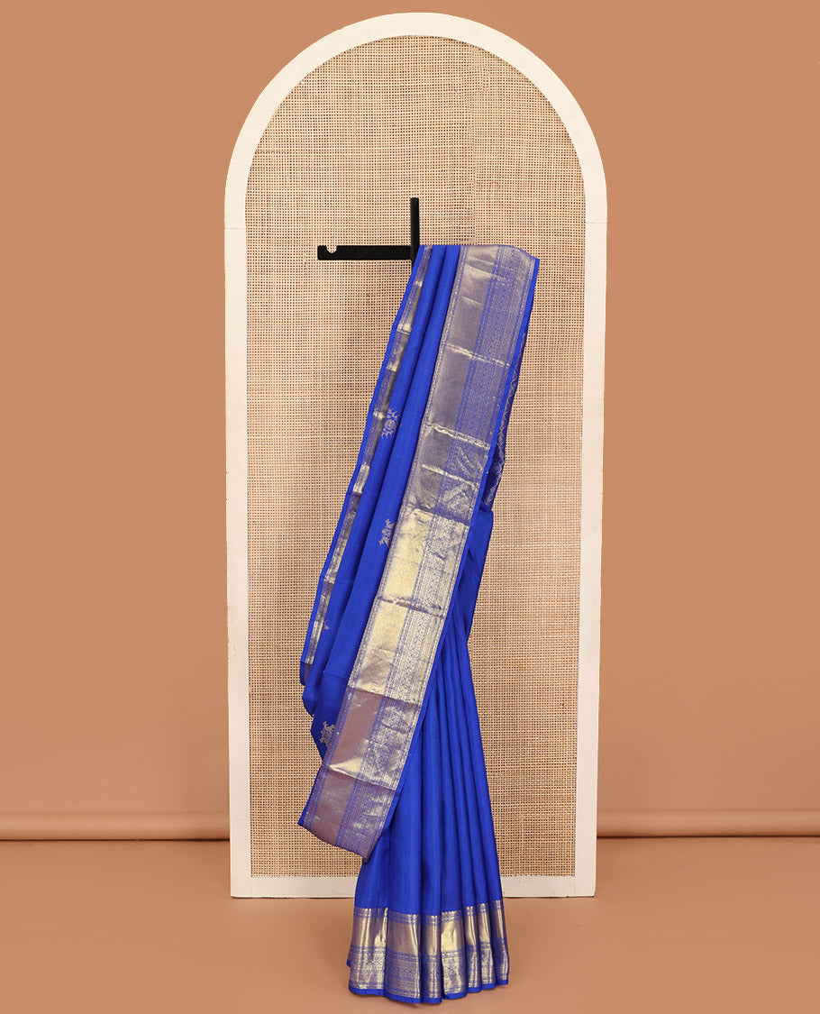 Royal blue zari buttas woven Kanchipuram silk saree, zari border of thilakam mokku, muthu, rudraksham, kodi visiry, chakram, and kathir designs, and jaal pallu