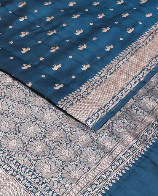 Blue raw mango silk saree with swan & flower buttas, traditional zari border & floral design pallu