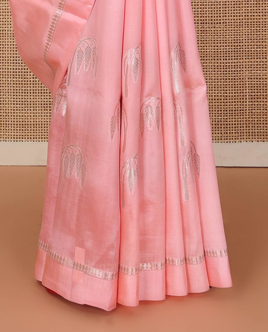 Peach floral buttas raw mango silk saree, zari border, and zari rich jaal pallu