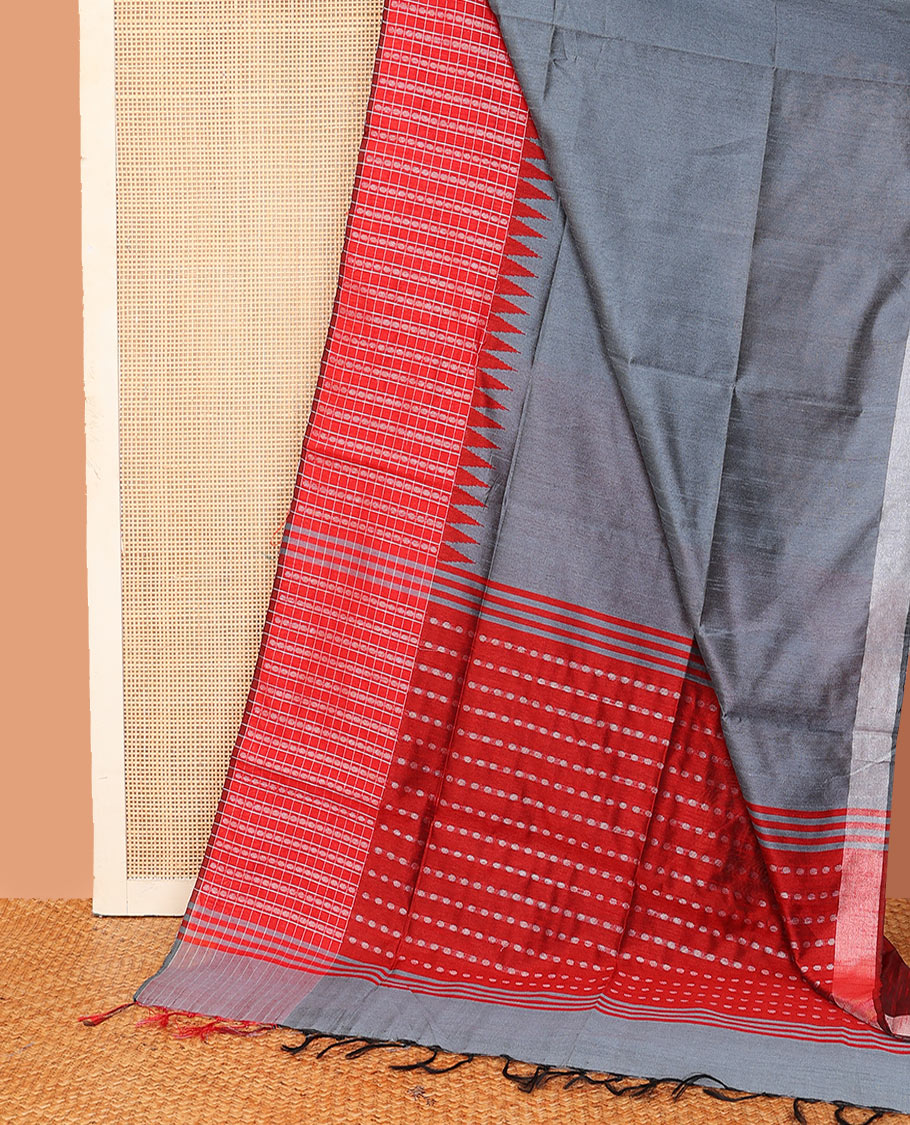 Grey plain dupion saree, contrast butta enclosed checked temple border, and buttas woven pallu