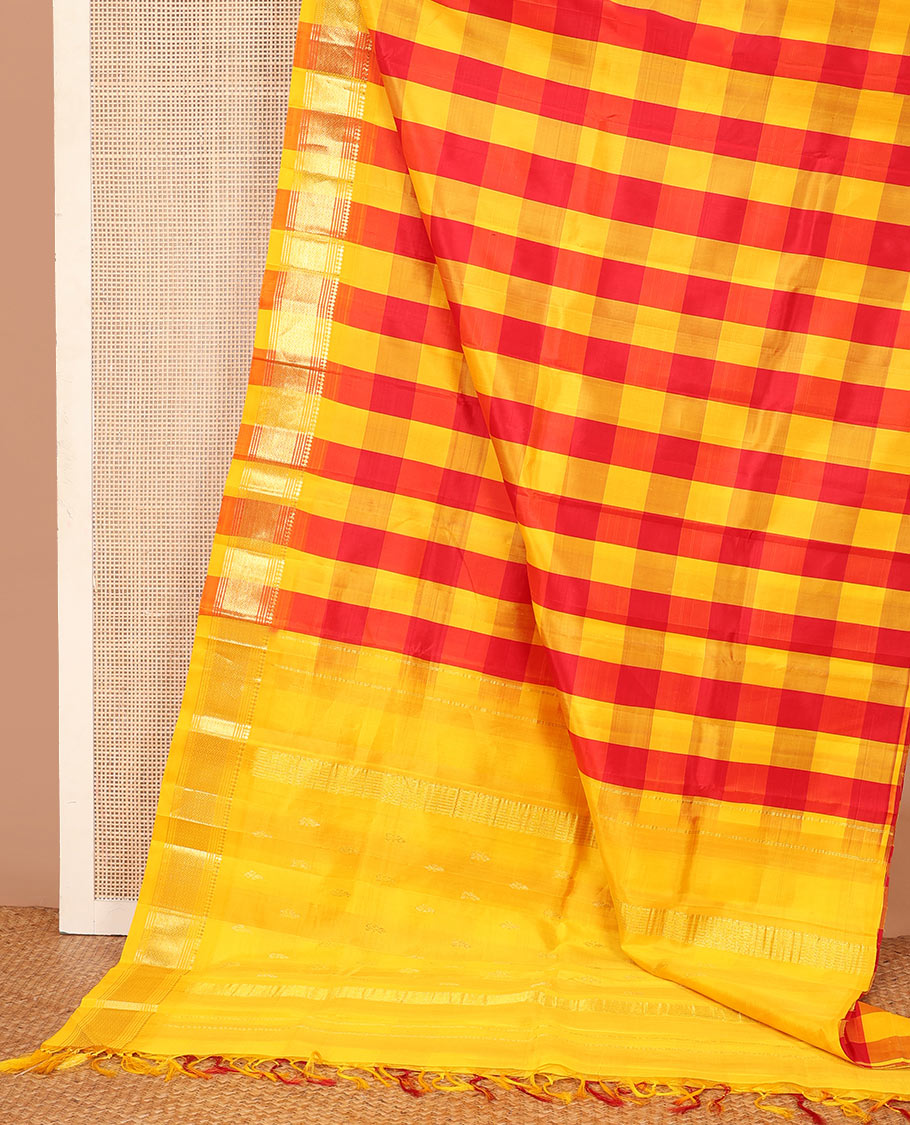 Multi-color checked with zari buttas Kanchipuram silk saree, one-sided border of panner sombu, muthu, and mayil kann designs, and zari design pallu