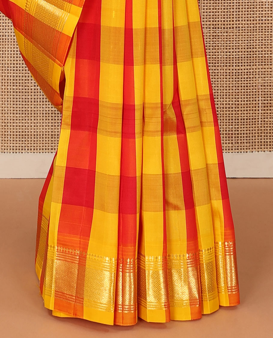 Multi-color checked with zari buttas Kanchipuram silk saree, one-sided border of panner sombu, muthu, and mayil kann designs, and zari design pallu