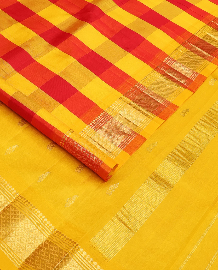 Multi-color checked with zari buttas Kanchipuram silk saree, one-sided border of panner sombu, muthu, and mayil kann designs, and zari design pallu