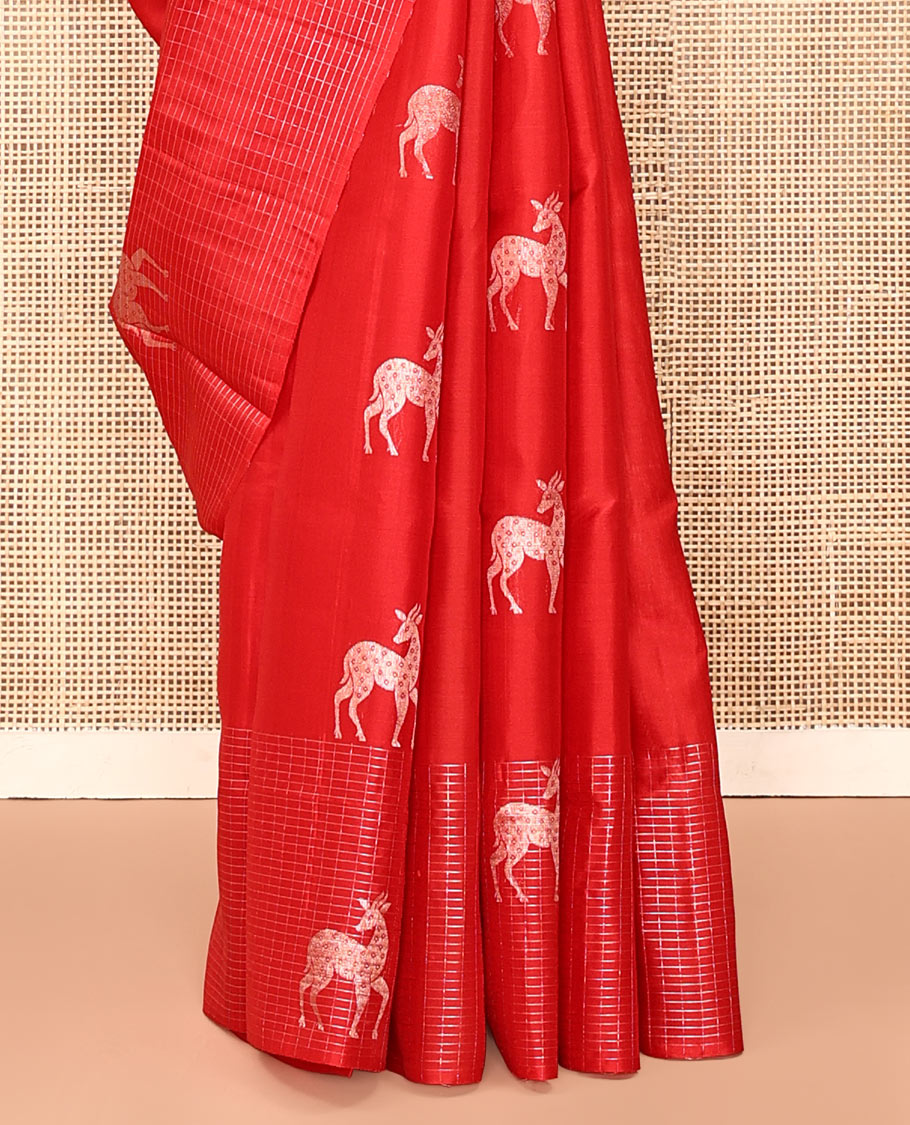 Red Mayuri Soft Silk Saree, Spotlighted with Maan Buttas All Over Its Body, Sparkling Zari Border of Checks and Maan Buttas, Sparsely Woven Pallu, and Paired with a Matching Blouse