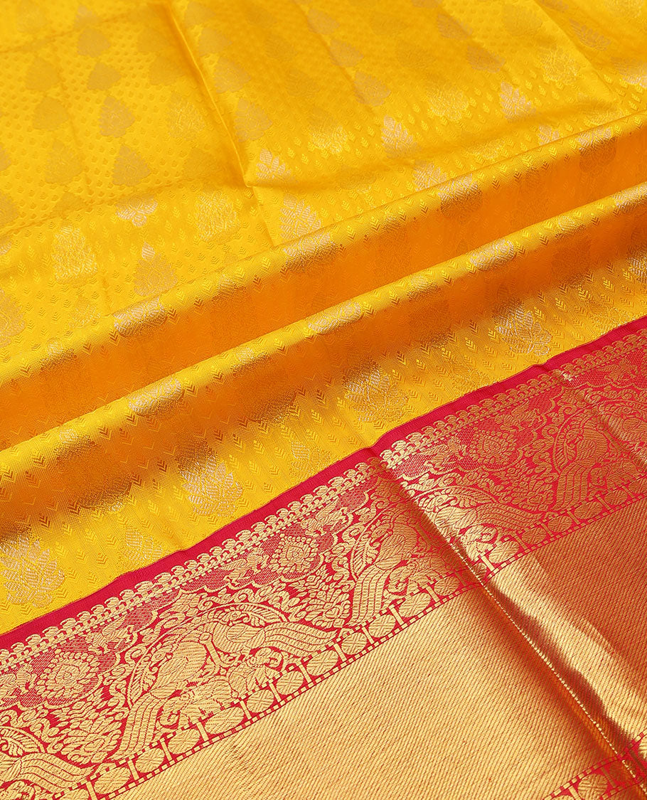 Yellow pure silk half-saree, zari buttas skirt, contrast border & blouse of manga,Muthu,kuthirai, rudraksha,yaanai & mayil & zari design dhavani