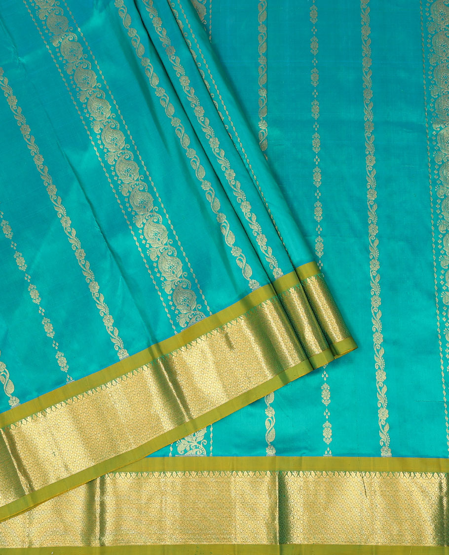 Blue zari design pure-silk half-saree with contrast border of jaal designs, contrast zari bordered blouse, and a jaal dhavani