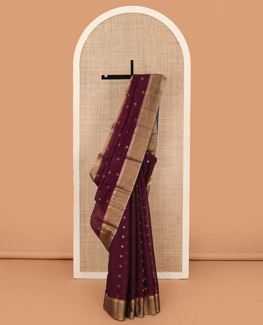 Maroon zari buttas silk cotton saree, contrast zari bavanji border, and pallu of geometric patterns