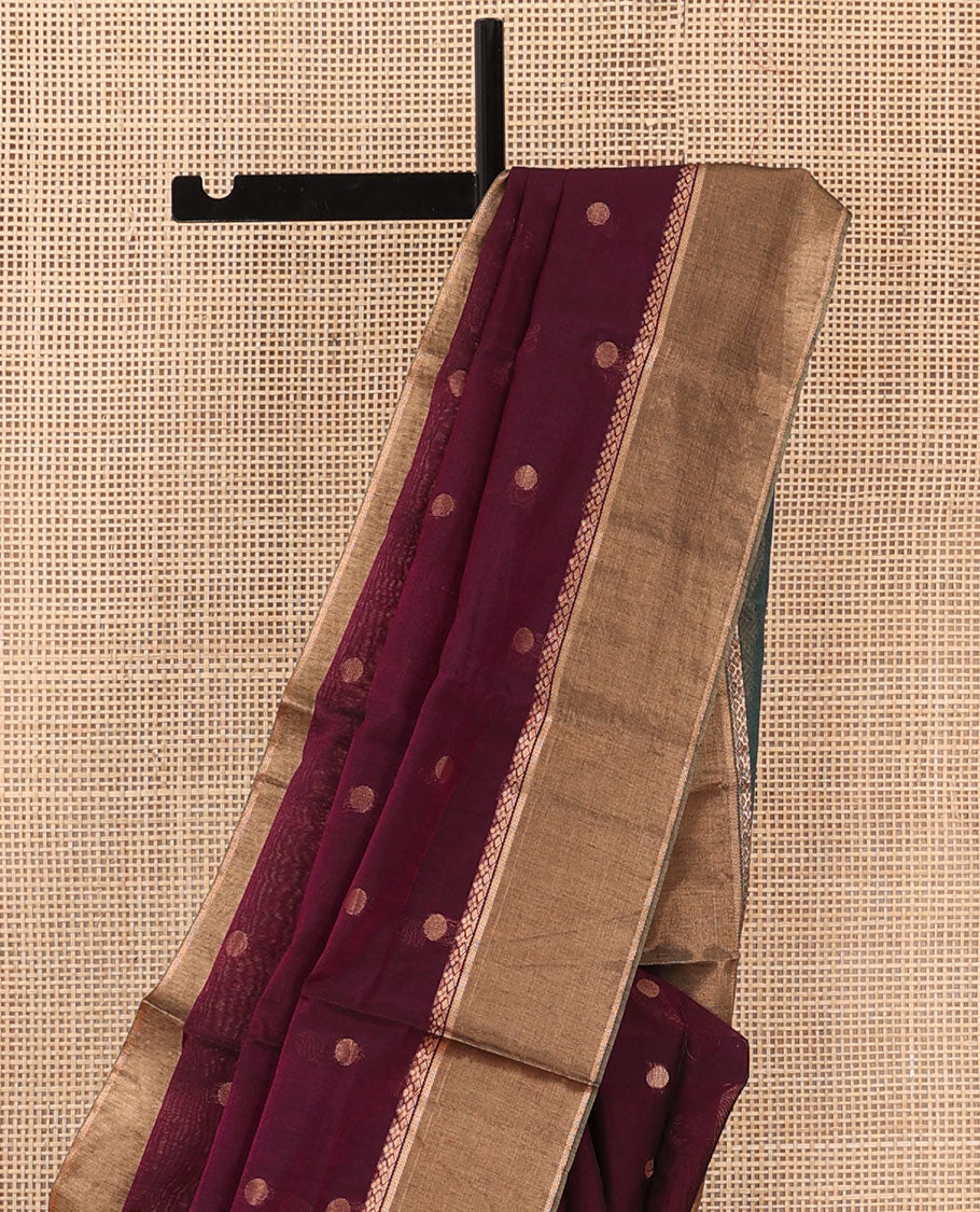 Maroon zari buttas silk cotton saree, contrast zari bavanji border, and pallu of geometric patterns