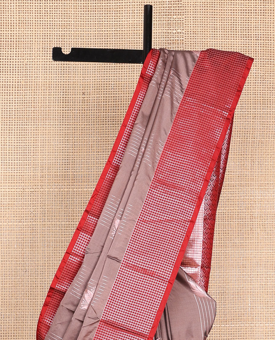 Brown semi-soft silk saree with zari stripes & leaf design, contrast zari checked border & ogee patterned pallu