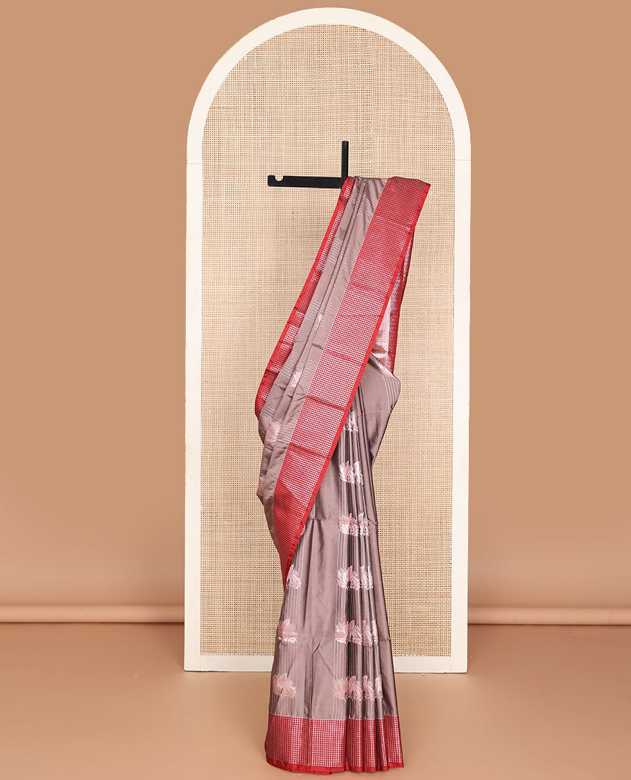 Brown semi-soft silk saree with zari stripes & leaf design, contrast zari checked border & ogee patterned pallu