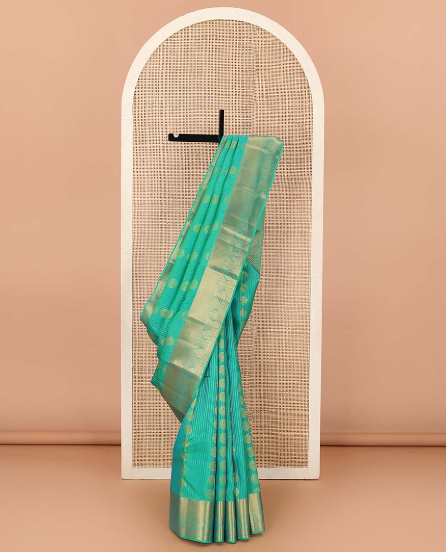 Green zari buttas Vasundhara silk mix saree, zari border of rudraksham, and diamond designs, and traditional design steeped border