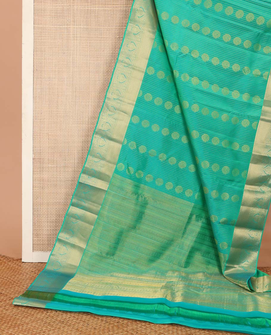 Green zari buttas Vasundhara silk mix saree, zari border of rudraksham, and diamond designs, and traditional design steeped border