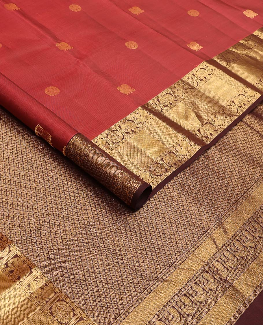 Red annam chakram buttas Vasundhara silk mix saree, contrast border of rudraksham, yaanai, mayil, chakram, vanki, mayil kann, and zari stripes, and jaal pallu