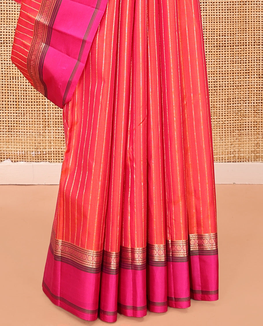 Orange Zari Striped Vasundhara Silk Saree, Contrast Kal Eragina Border of Neli, Muthu, Cross Kamalam Designs, Grand Pallu, and a Contrast Blouse