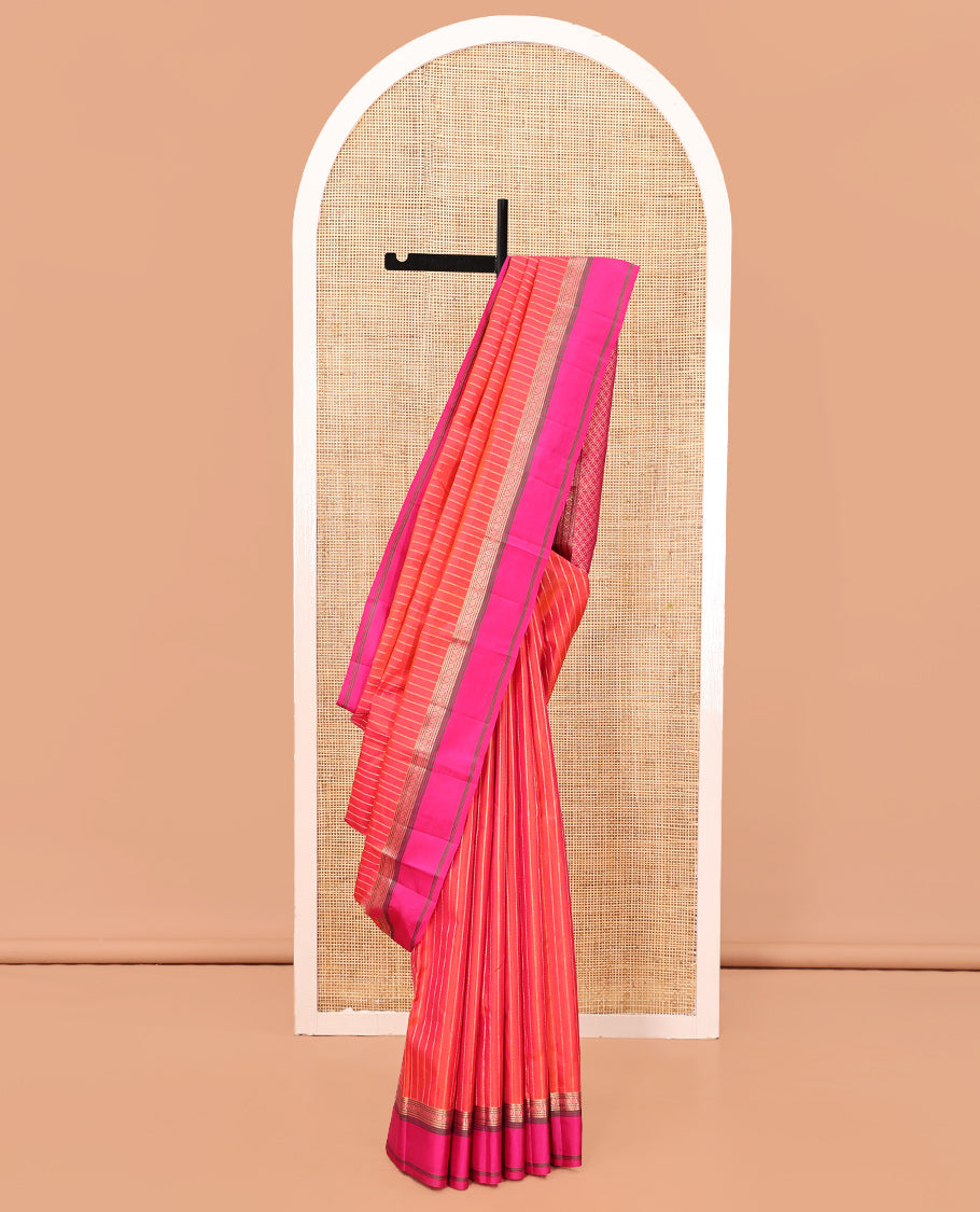 Orange Zari Striped Vasundhara Silk Saree, Contrast Kal Eragina Border of Neli, Muthu, Cross Kamalam Designs, Grand Pallu, and a Contrast Blouse