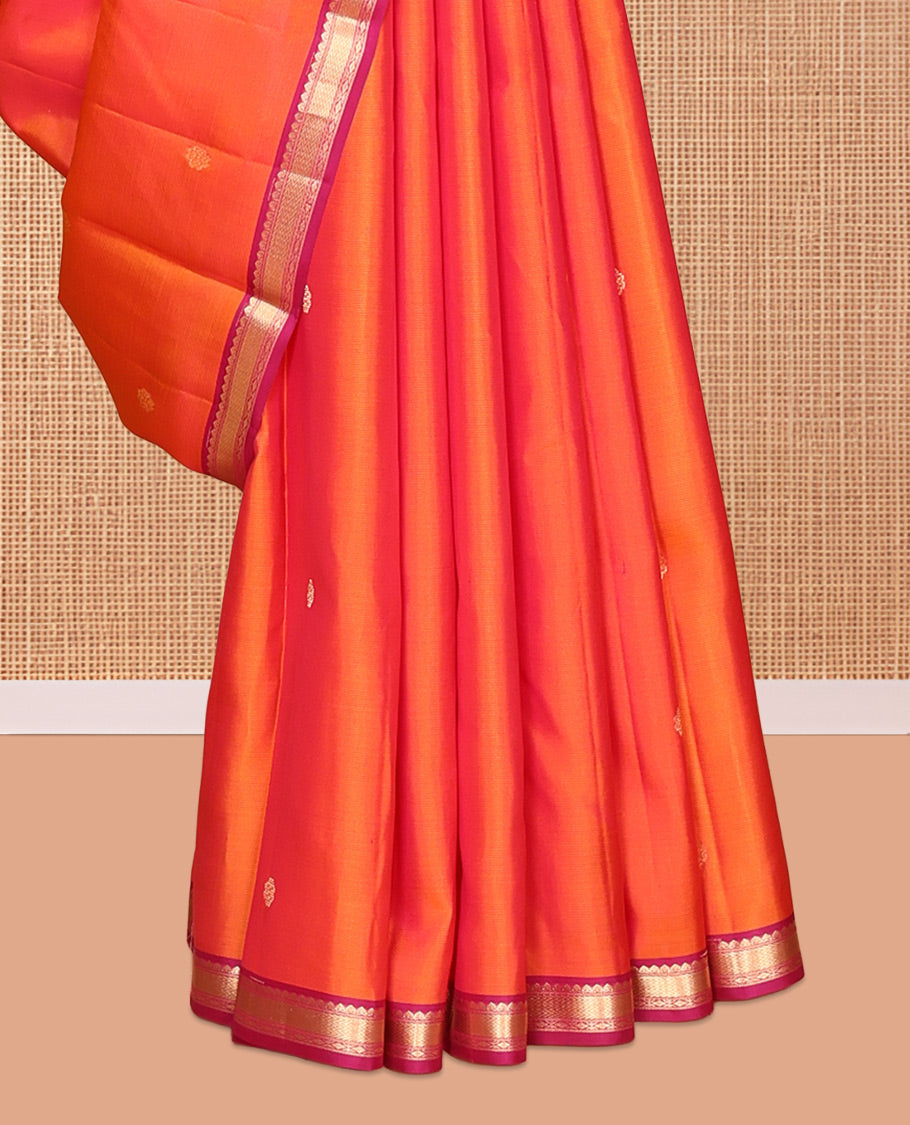 Orange Vasundhara Silk Saree, Embellished with Zari Buttas, Contrast Border of Thilakam Mokku, Vanki, and Diamond Designs, Grand Pallu, and a Contrast Blouse