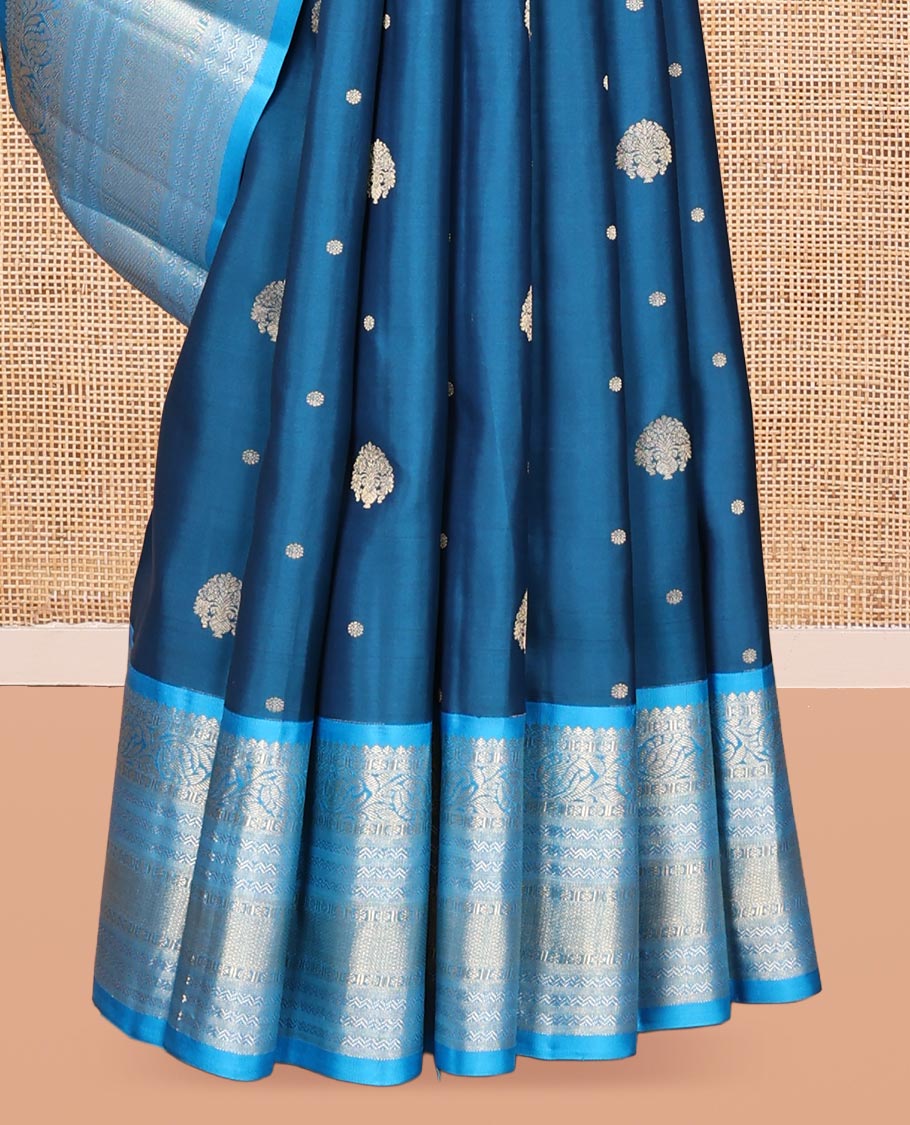 Blue Vasundhara Silk Saree, Decorated with Zari Buttas, Contrast Rettai Pettu Border of Thilakam Mokku, Kodi Visiry, Neli, and Mayil Kann Designs, Grand Pallu, and Contrast Blouse