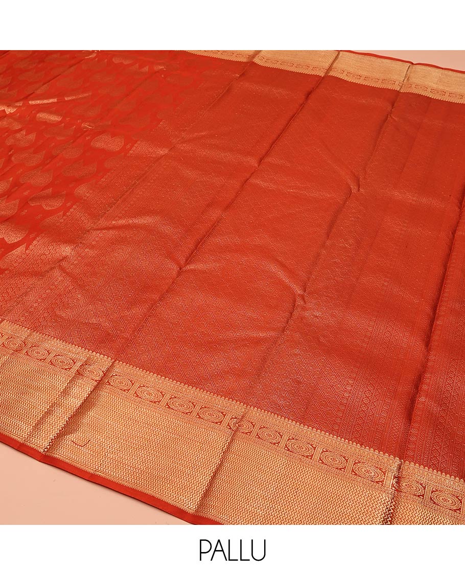Rust Kanchipuram Wedding Silk Saree, Steeped with Zari Buttas All Over Its Body, Highlighted by Zari Border of Chakram and Vanki Designs, Grand Jaal Pallu and Paired with a Matching Blouse