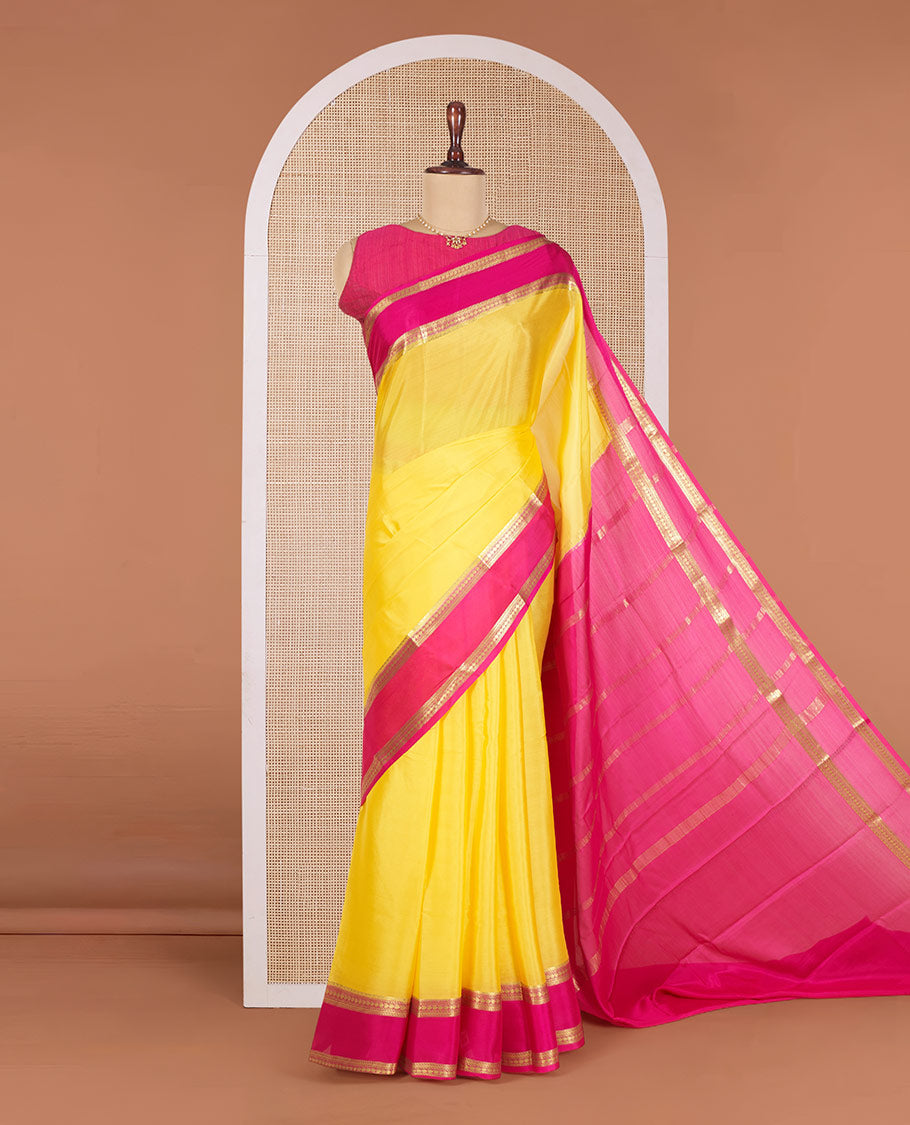Yellow Plain Mysore Silk Saree, Complemented by a Contrast Traditional Zari Design Border, Pallu Steeped with Zari Stripes, and Paired with a Contrast Blouse