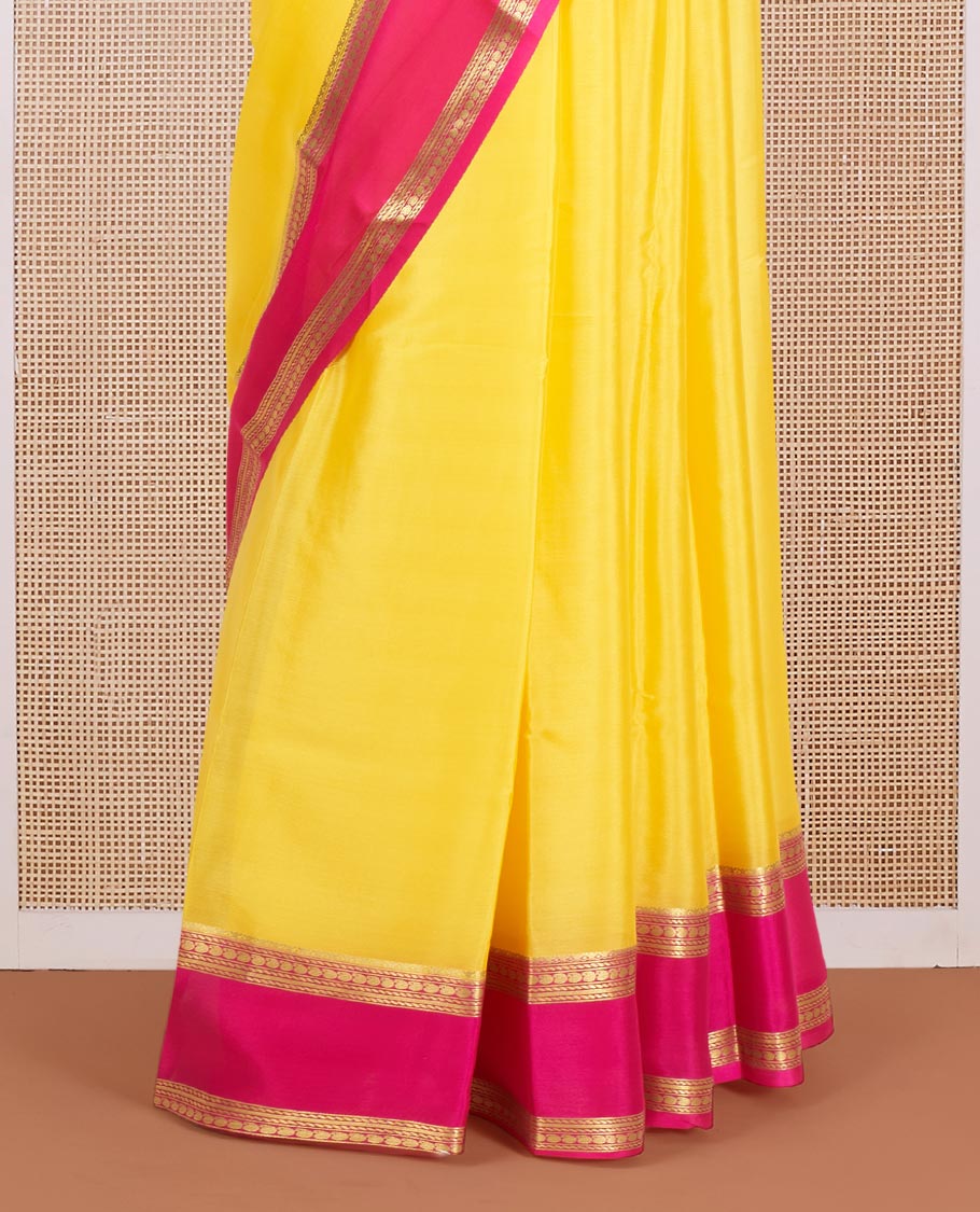 Yellow Plain Mysore Silk Saree, Complemented by a Contrast Traditional Zari Design Border, Pallu Steeped with Zari Stripes, and Paired with a Contrast Blouse