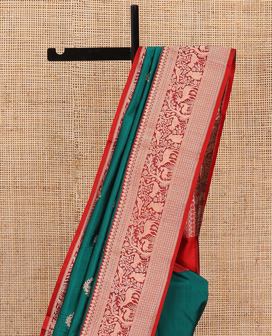 Green floral buttas katan silk saree, contrast traditional border of flora-fauna designs, and pallu of peacock, and derr motifs enclosed circles