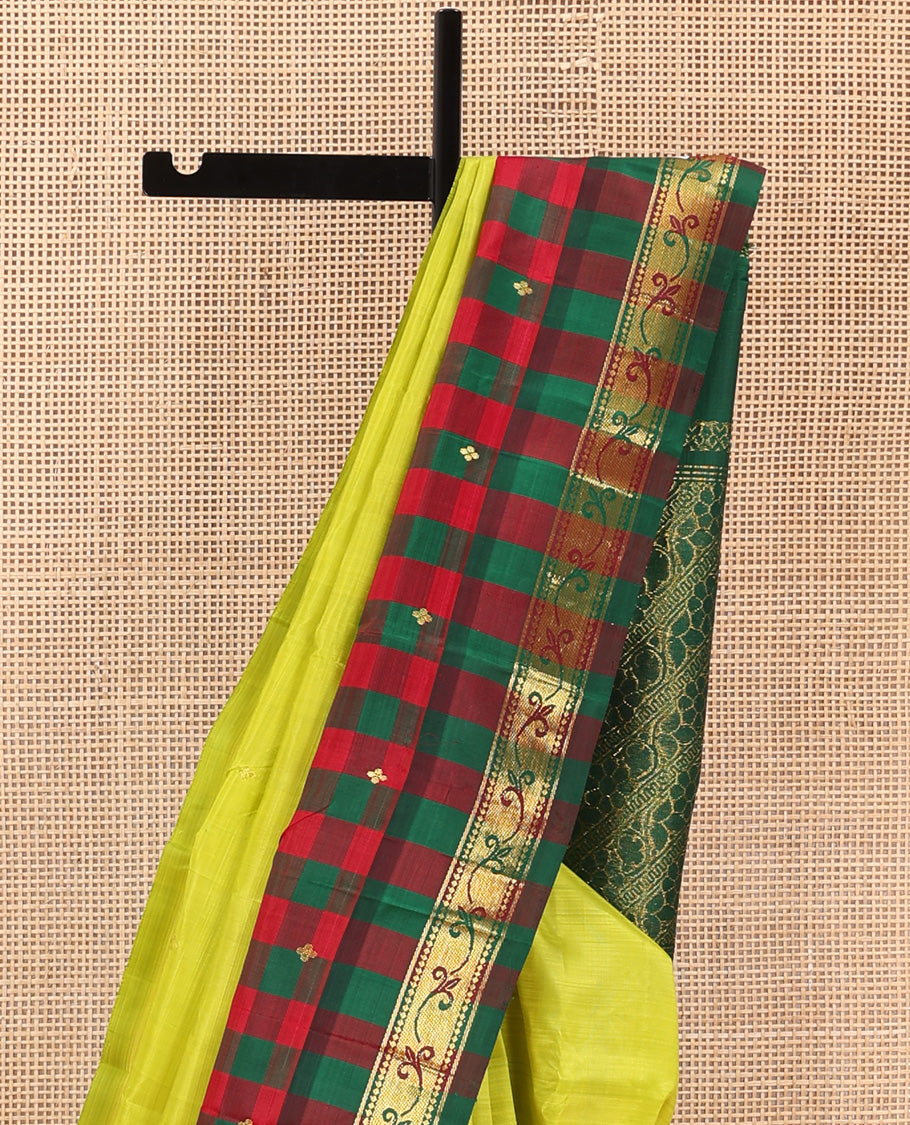 Parrot green zari buttas Kanchipuram silk saree, contrast one-sided checked border of thazampoo rekku, and kamalam designs, and zari design pallu