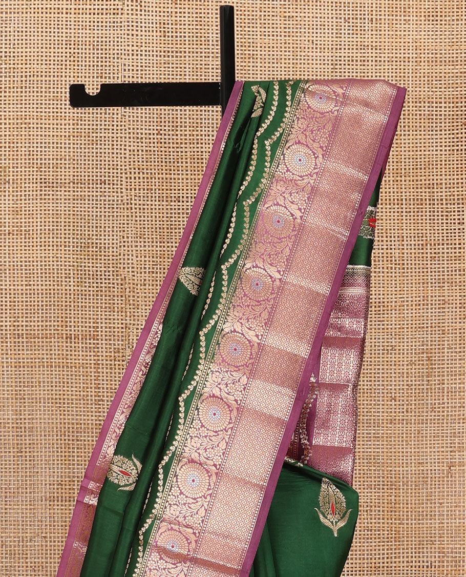 Dark green floral meena buttas raw mango silk saree, contrast floral design border creeper, and floral design pallu