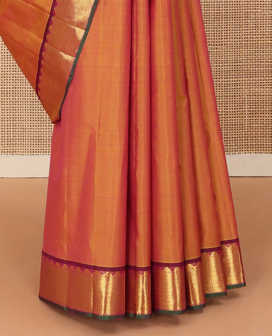 Orange Plain Kanchipuram Silk Saree, Complemented by Contrast Border of Thazampoo Rekku, Muthu and Vanki Designs, Zari Designs Woven Pallu, and Paired with a Contrast Blouse