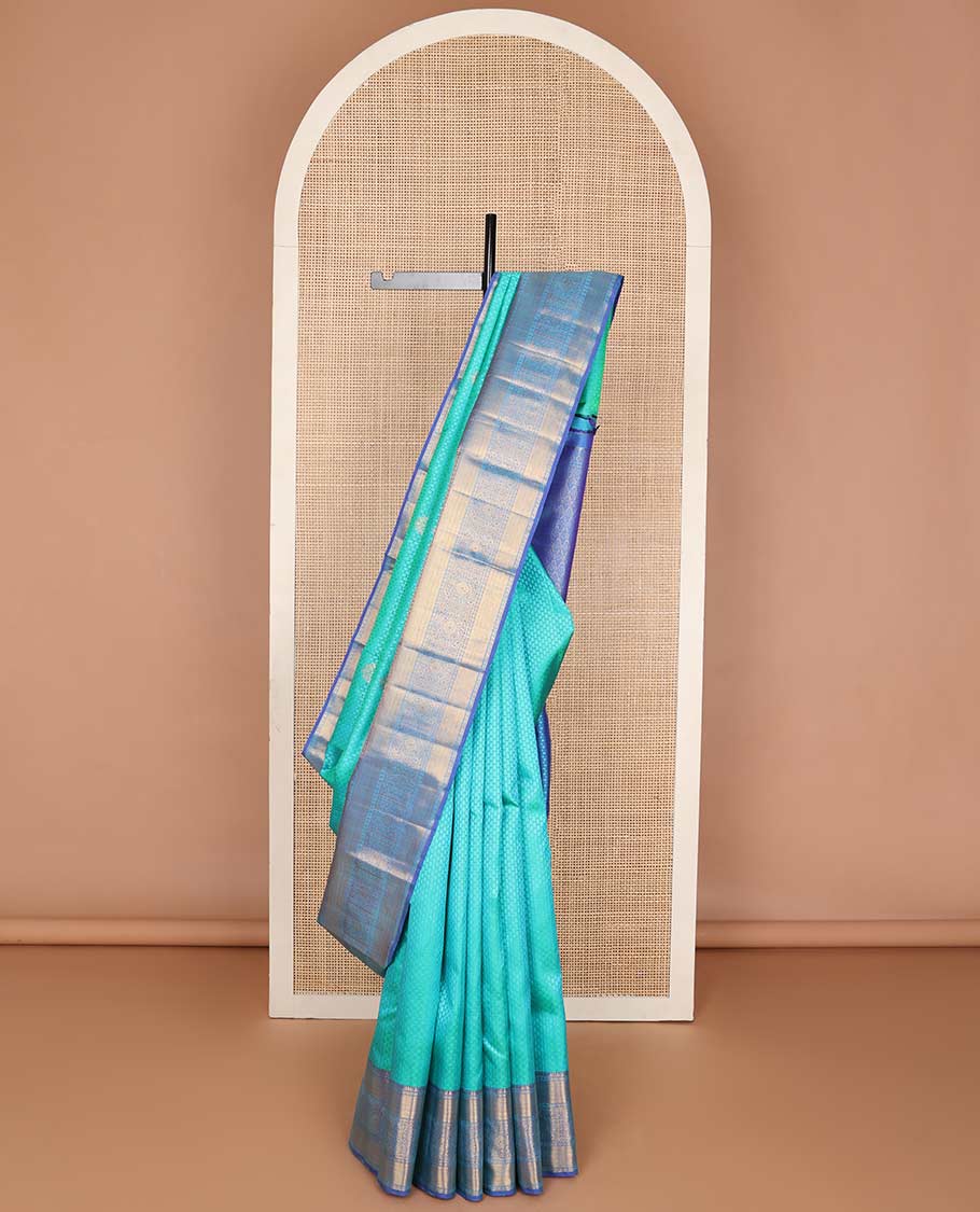 Light blue leaf design silk saree with contrast rekku, paun, banaras design & floral jaal pallu